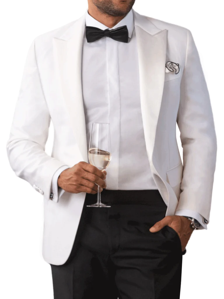 Balani custom white dinner jacket with black slacks and black bowtie.